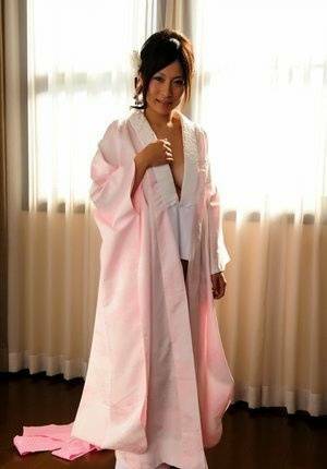 Japanese solo girl slips off her robe to reveal her nice boobs in white socks - Japan on leaks.pics