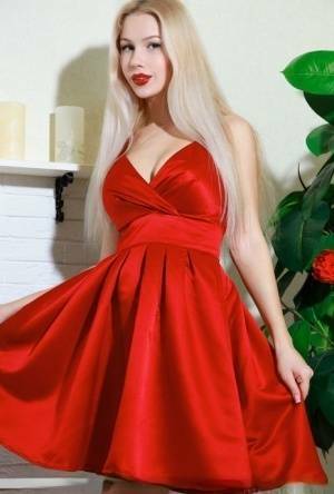 Nice blonde teen Genevieve Gandi removes red dress to display her trimmed muff on leaks.pics