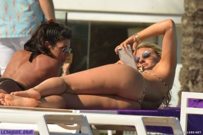 Leaked Danielle Armstrong Sunbathing In Sexy Yellow And Thong Leopard Bikini on leaks.pics