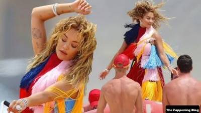 Rita Ora Wears a Bright Dress as She Does a Sexy Shoot at Maroubra Beach on leaks.pics