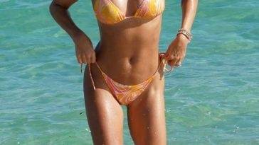 Sylvie Meis Rocks a Skimpy Orange Bikini at the Beach in Miami on leaks.pics