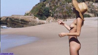 Camille Rowe nude on the beach on leaks.pics