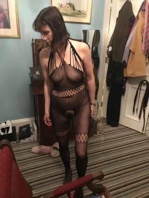 Older amateur Slut Scot Susan shows her beaver on a bed in a bodystocking - Scotland on leaks.pics