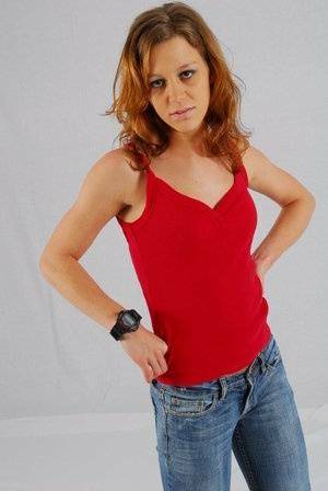 Natural redhead Sabine shows off her black G-shock watch while fully clothed on leaks.pics