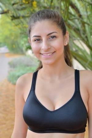 Teen jogger pauses to take off her spandex pants and bra on a run on leaks.pics