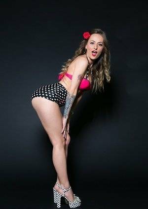 Tattooed pornstar Natasha Starr peeling off brassiere and granny panties on leaks.pics