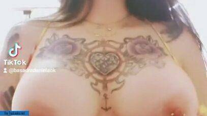 Topless sex model dances another TikTok trend with fake boobs on leaks.pics